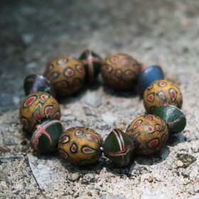 Antique peacock tail bead bracelet - yellow & green