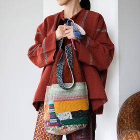 Kantha bucket bag with burnt orange piad